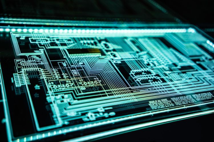 a computer chip lit with blue light