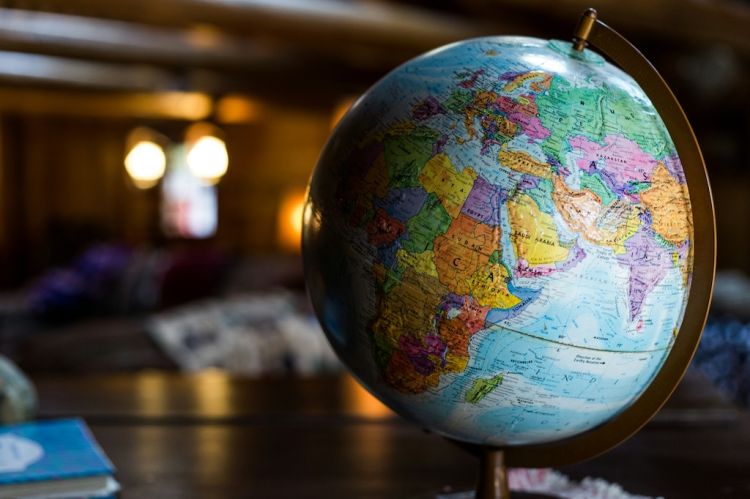 a desk globe sitting on a table