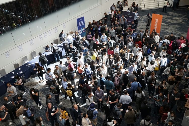 crowd of people at a trade show