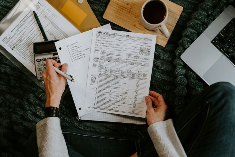 a person reviewing tax return documents
